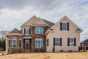Exterior - Front Elevation for Traditional House Plan #927-28 - 4 bed, 3 bath